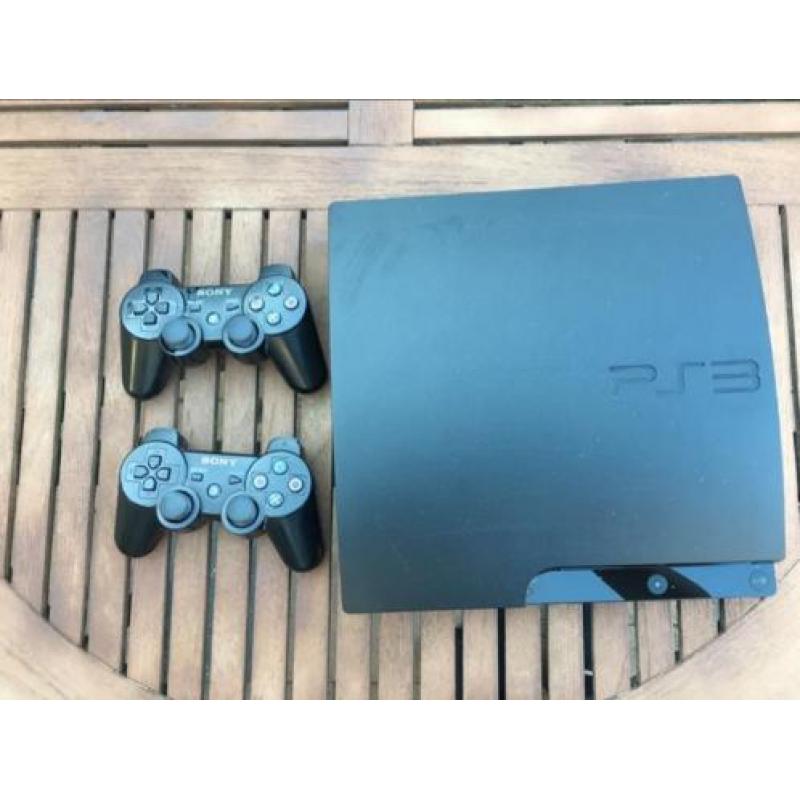 Playstation 3 slim met 2 controllers en 6 games
